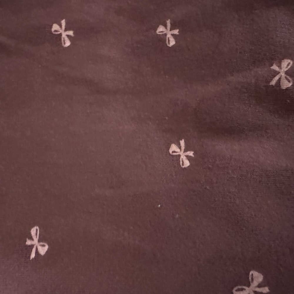 Plum Fabric with pink Bow Pattern